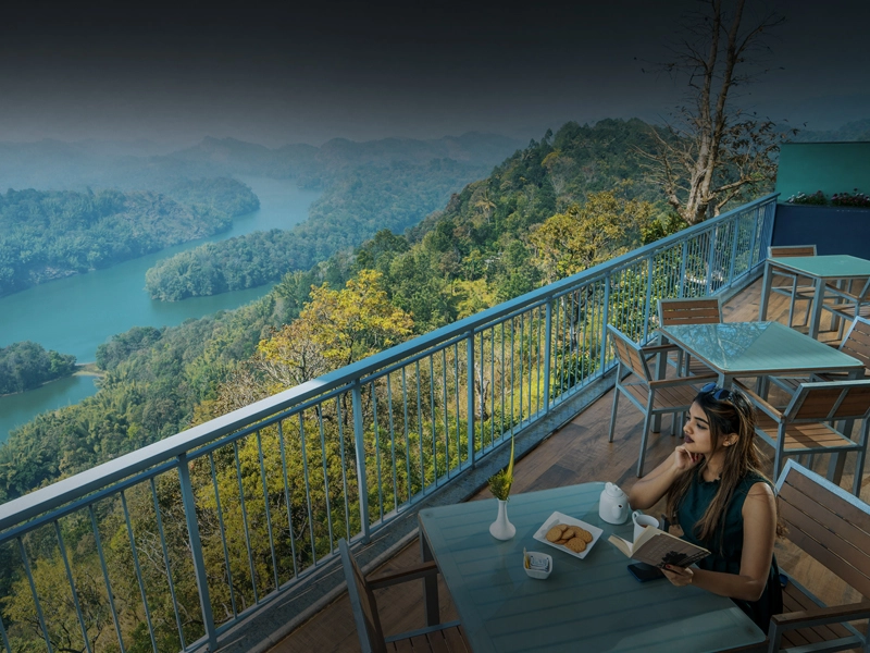 Dining area with panoramic views at Ragamaya Spa & Resort, Munnar