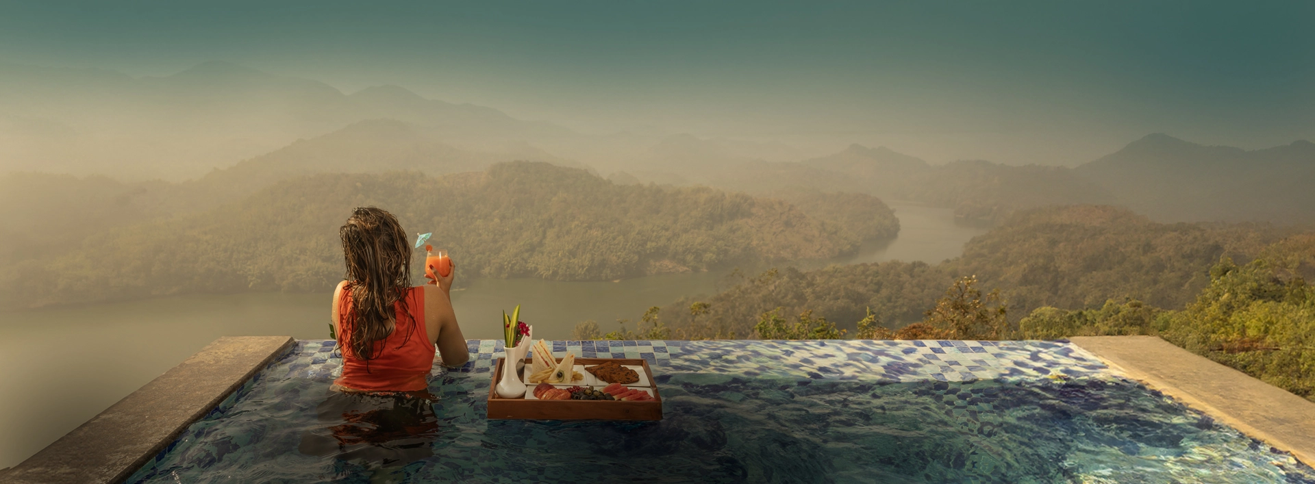 Relaxing poolside view at Ragamaya Spa & Resort, Munnar
